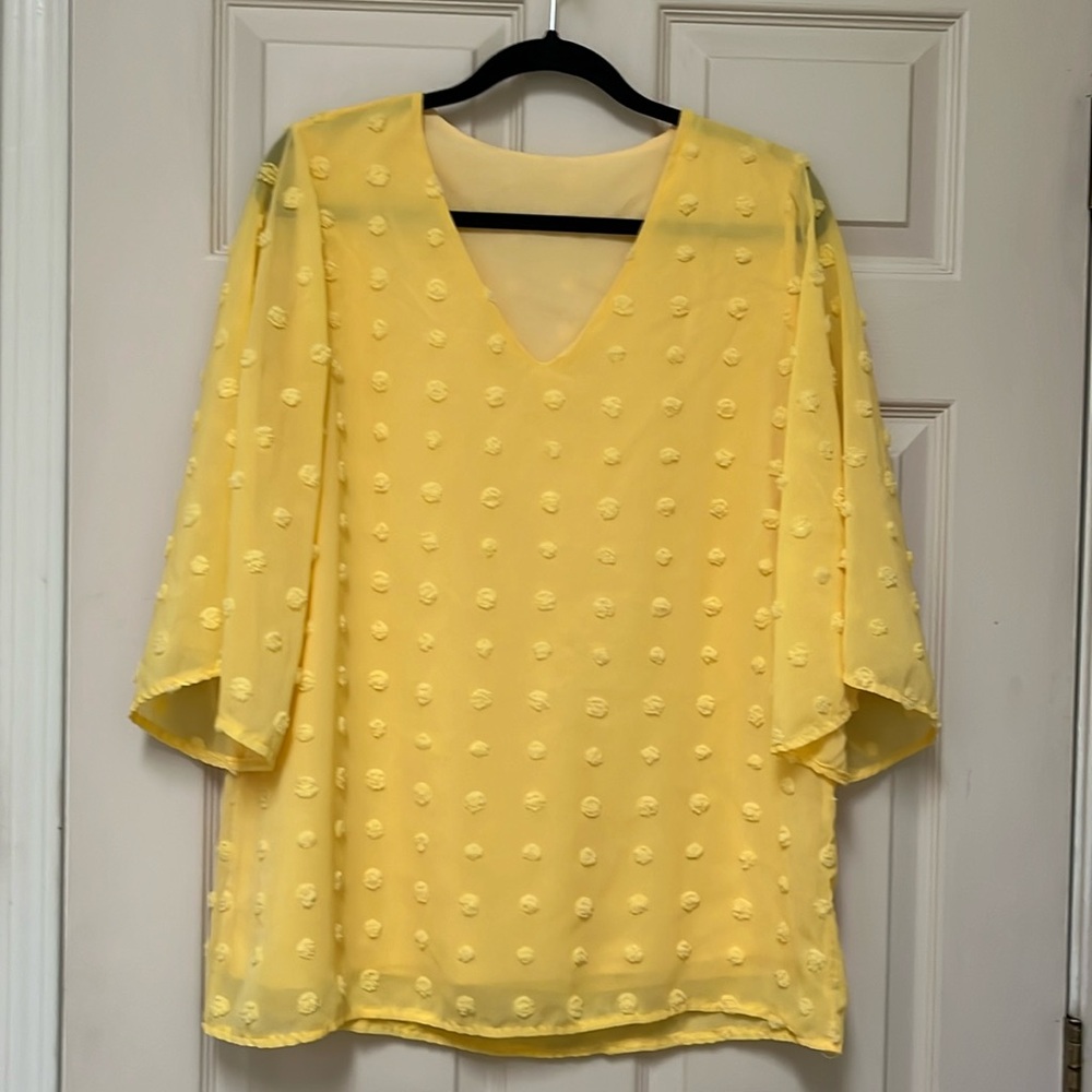 Yellow pull over shirt